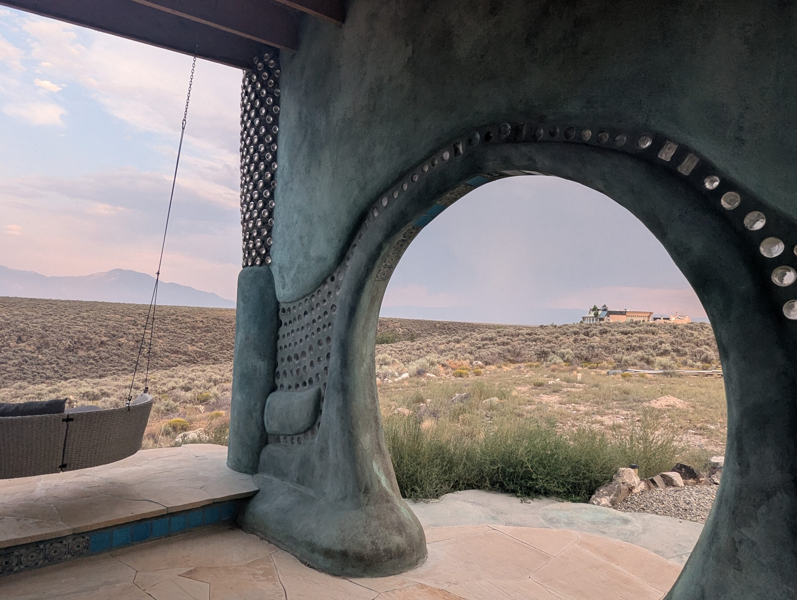 Photo of the outside of an Earthship